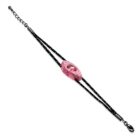 Fekete-fehér színű szövet karkötő, ovális alakú, virág mintás üveggyöngy dísszel