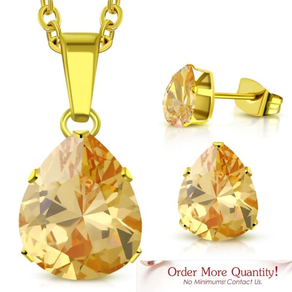 Arany színű nemesacél szett, nyaklánc, medál és fülbevaló, pezsgő színű cirkónia kristállyal