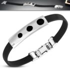 Fekete kaucsuk karkötő, ezüst színű, kivágott nemesacél dísszel